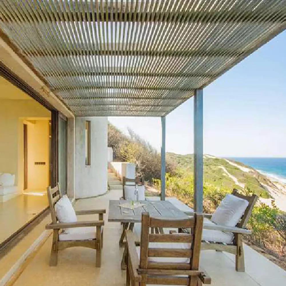 picturesque patio with an ocean view at the beach house at matalai