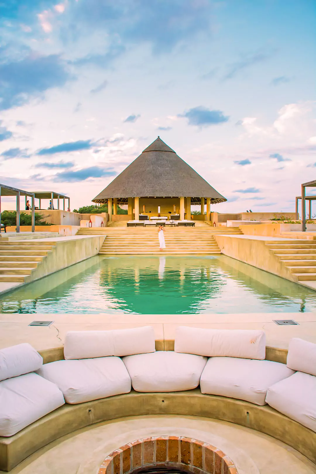 stunning image of the pool and palapa at matalai house